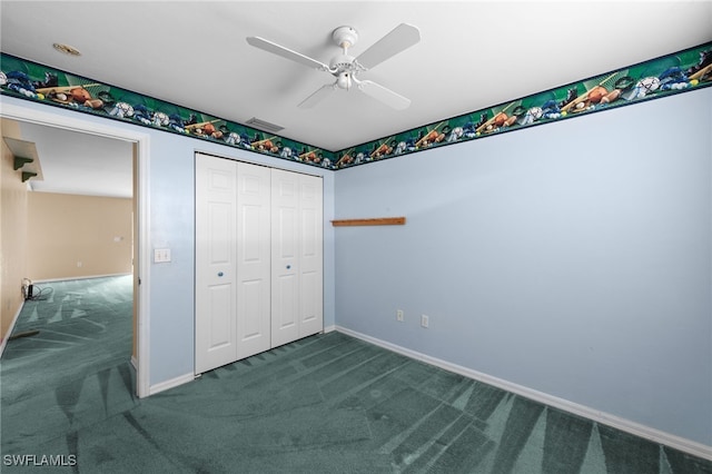 206 SE 12th Ter, Cape Coral, FL 33990 - unfurnished bedroom with carpet floors, baseboards, a closet, and ceiling fan