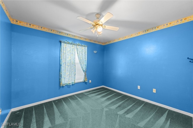 206 SE 12th Ter, Cape Coral, FL 33990 - empty room featuring carpet flooring, a ceiling fan, and baseboards