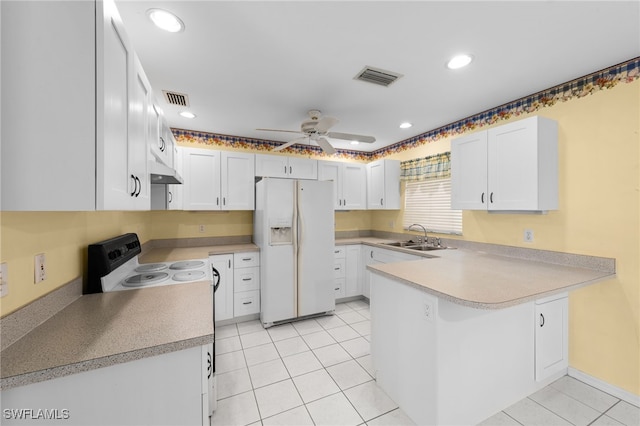 206 SE 12th Ter, Cape Coral, FL 33990 - kitchen with white appliances, a sink, a peninsula, ceiling fan, and light countertops