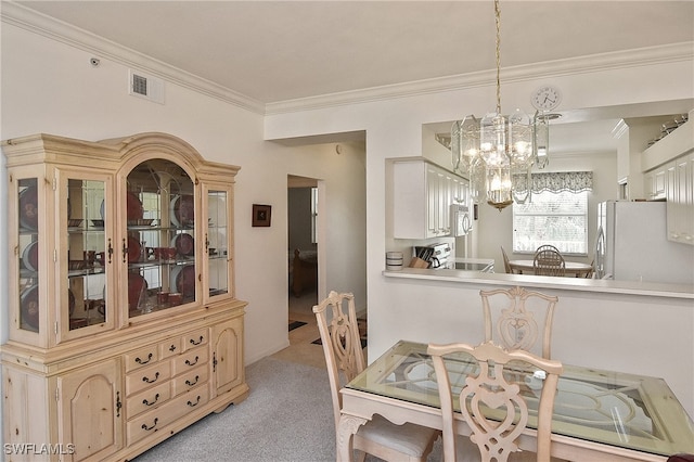 10350 Washingtonia Palm Way Unit 4234, Fort Myers, FL 33966 - dining room with a chandelier, crown molding, and light colored carpet