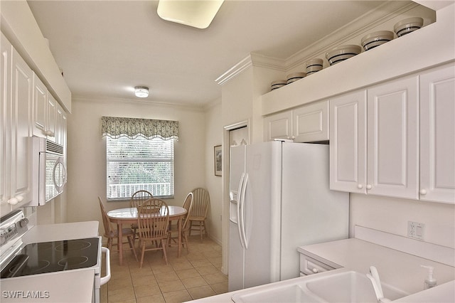 10350 Washingtonia Palm Way Unit 4234, Fort Myers, FL 33966 - kitchen featuring white appliances, white cabinets, ornamental molding, light tile patterned floors, and light countertops