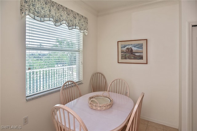 10350 Washingtonia Palm Way Unit 4234, Fort Myers, FL 33966 - dining space featuring baseboards, crown molding, and light tile patterned floors