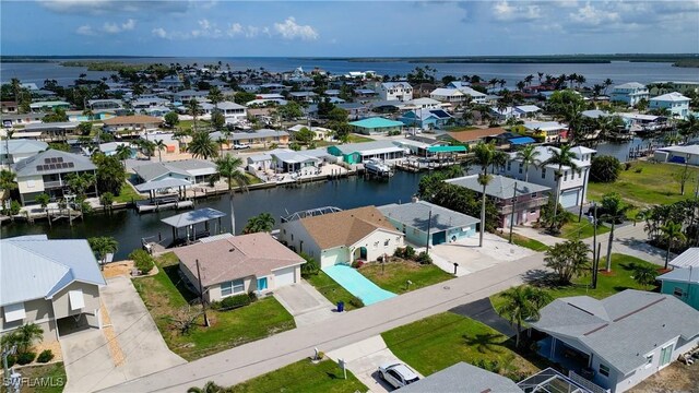 2692 Clyde St, Matlacha, FL 33993 - aerial perspective of suburban area featuring a large body of water