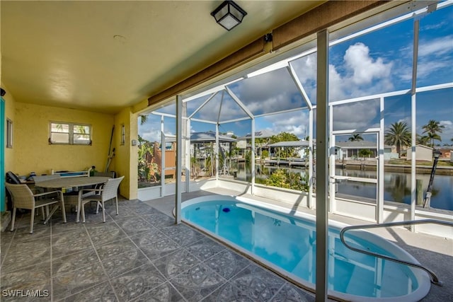 2692 Clyde St, Matlacha, FL 33993 - outdoor pool featuring a water view and a patio area