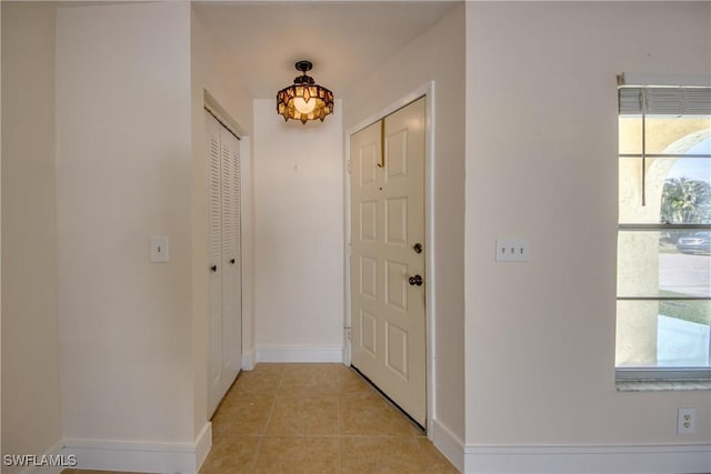 2692 Clyde St, Matlacha, FL 33993 - hallway featuring light tile patterned floors and baseboards