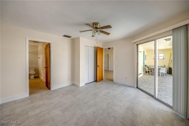 2692 Clyde St, Matlacha, FL 33993 - unfurnished bedroom with access to outside, connected bathroom, baseboards, ceiling fan, and light tile patterned flooring