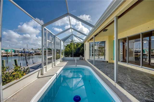 2692 Clyde St, Matlacha, FL 33993 - swimming pool with a water view, a patio, and a lanai