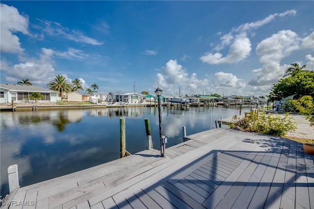 2692 Clyde St, Matlacha, FL 33993 - dock featuring a water view and a residential view