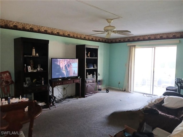 198 Joel Blvd Unit 3, Lehigh Acres, FL 33936 - carpeted living area with ceiling fan