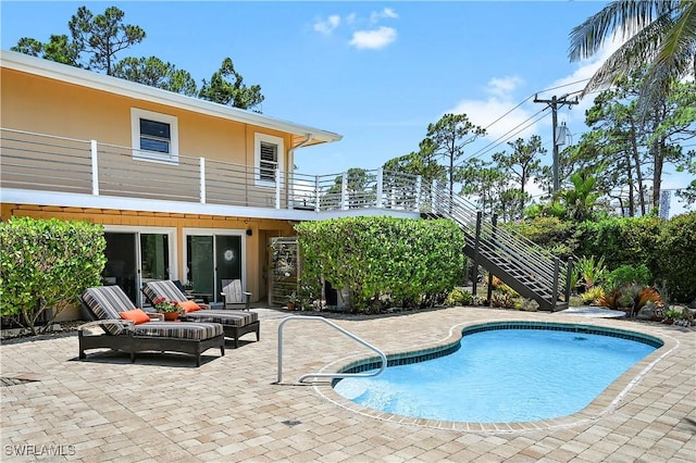 4680 Key Largo Ln, Bonita Springs, FL 34134 - swimming pool featuring a patio area and stairs
