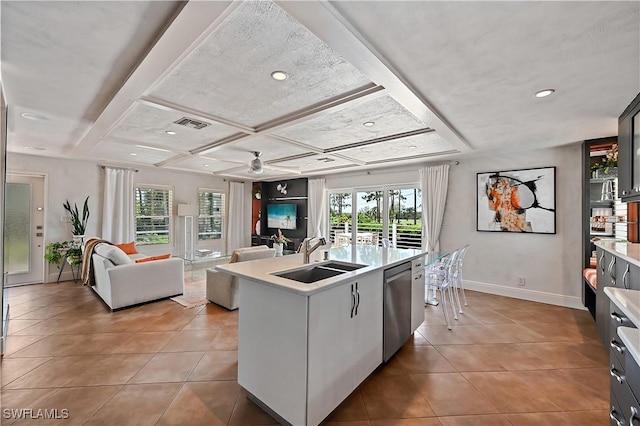 4680 Key Largo Ln, Bonita Springs, FL 34134 - kitchen featuring a sink, dishwasher, light tile patterned floors, light countertops, and open floor plan