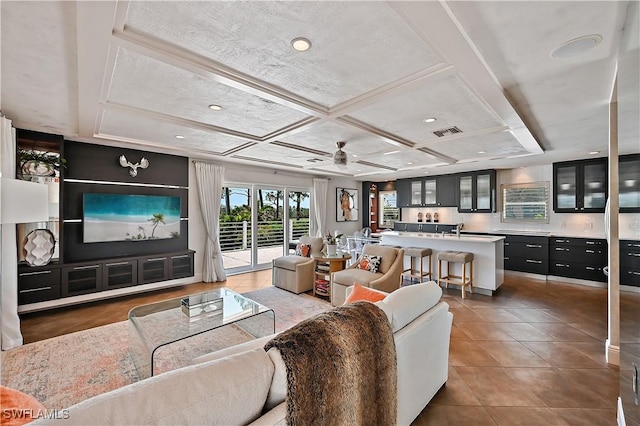 4680 Key Largo Ln, Bonita Springs, FL 34134 - living area featuring coffered ceiling, tile patterned flooring, ceiling fan, and recessed lighting
