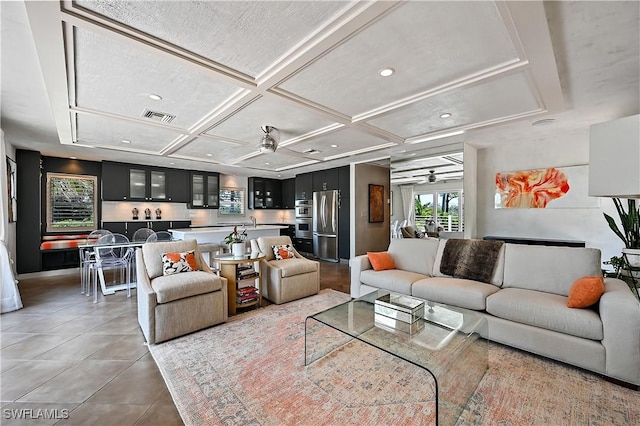 4680 Key Largo Ln, Bonita Springs, FL 34134 - living room with a ceiling fan, coffered ceiling, tile patterned flooring, and recessed lighting