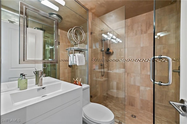 4680 Key Largo Ln, Bonita Springs, FL 34134 - full bathroom with a stall shower, vanity, and toilet