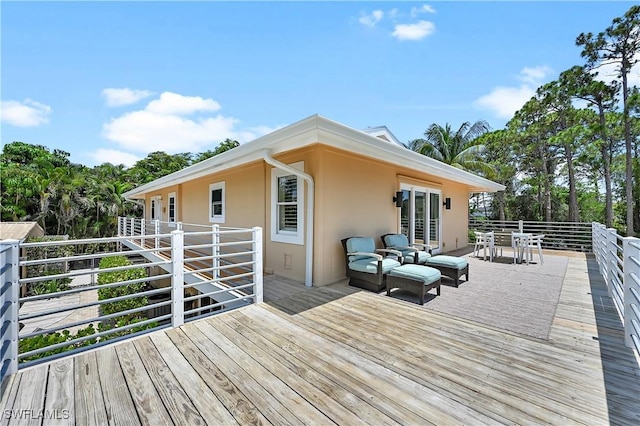 4680 Key Largo Ln, Bonita Springs, FL 34134 - deck featuring an outdoor hangout area