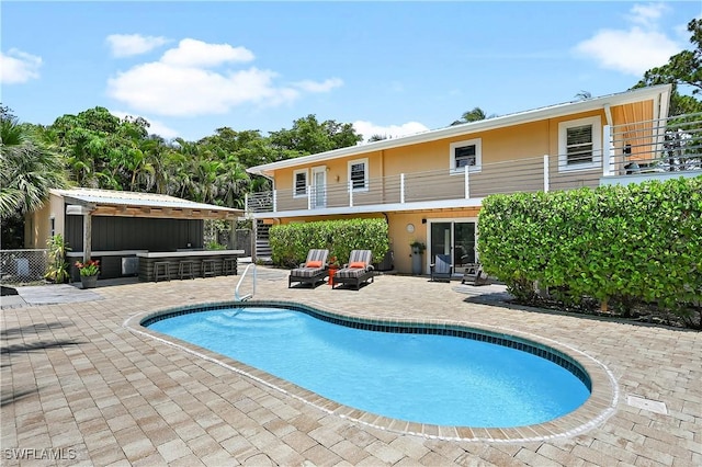 4680 Key Largo Ln, Bonita Springs, FL 34134 - swimming pool featuring a patio