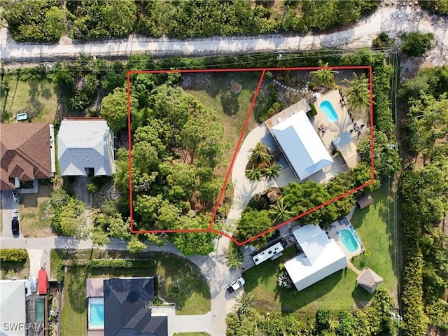 4680 Key Largo Ln, Bonita Springs, FL 34134 - aerial overview of property's location featuring a pool area and property boundaries highlighted