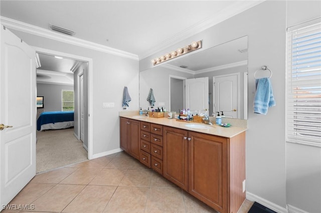 8364 Laurel Lakes Blvd, Naples, FL 34119 - ensuite bathroom featuring double vanity, ornamental molding, and tile patterned floors