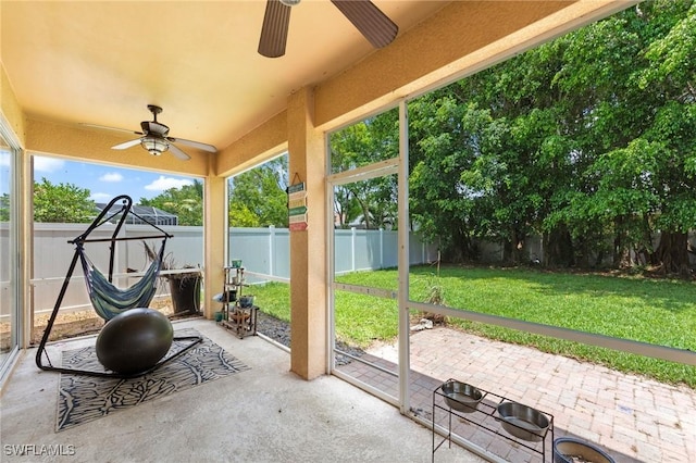 8364 Laurel Lakes Blvd, Naples, FL 34119 - fenced backyard featuring a ceiling fan and a patio area