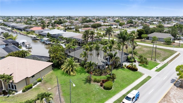4009 Chiquita Blvd S, Cape Coral, FL 33914 - aerial perspective of suburban area with a large body of water