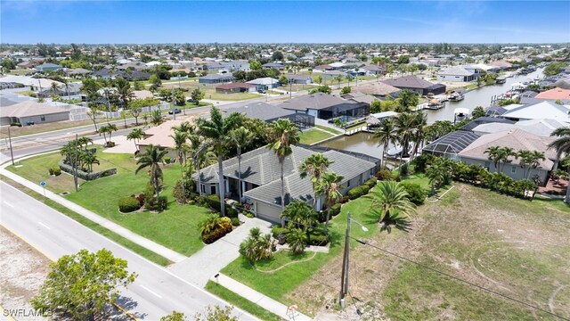4009 Chiquita Blvd S, Cape Coral, FL 33914 - aerial perspective of suburban area with a large body of water