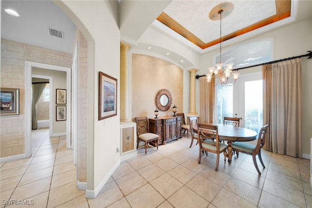 4009 Chiquita Blvd S, Cape Coral, FL 33914 - dining area featuring plenty of natural light, light tile patterned floors, decorative columns, a towering ceiling, and a chandelier