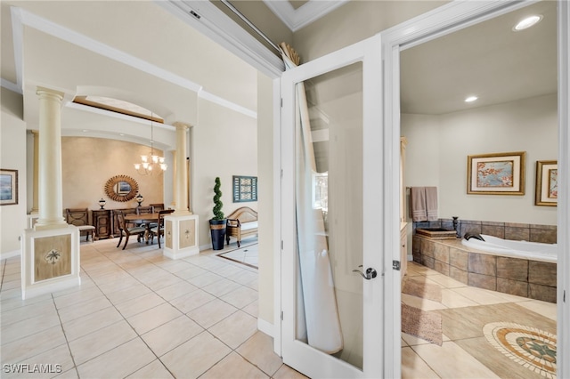 4009 Chiquita Blvd S, Cape Coral, FL 33914 - hall featuring decorative columns, light tile patterned flooring, a chandelier, crown molding, and recessed lighting