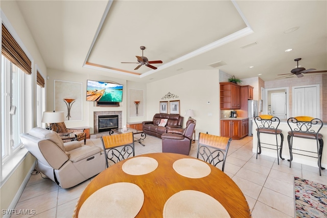 4009 Chiquita Blvd S, Cape Coral, FL 33914 - living room with a raised ceiling, a ceiling fan, and light tile patterned flooring