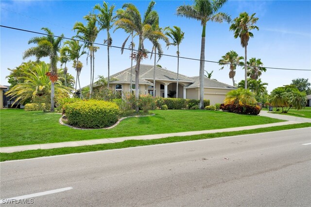 4009 Chiquita Blvd S, Cape Coral, FL 33914 - single story home featuring a front lawn