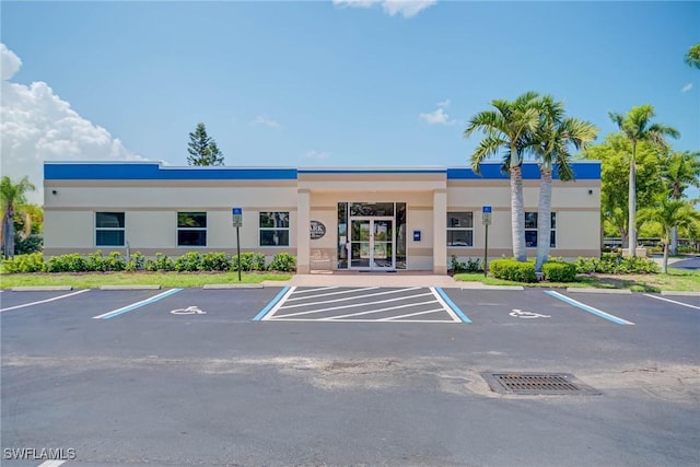 14931 Park Lake Dr Unit 209, Fort Myers, FL 33919 - view of property with uncovered parking