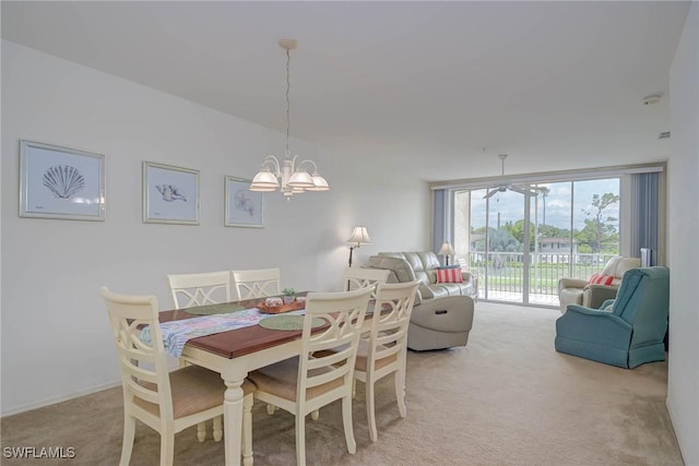14931 Park Lake Dr Unit 209, Fort Myers, FL 33919 - dining room with light colored carpet and a chandelier