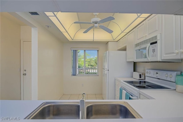 14931 Park Lake Dr Unit 209, Fort Myers, FL 33919 - kitchen featuring white appliances, light countertops, and ceiling fan