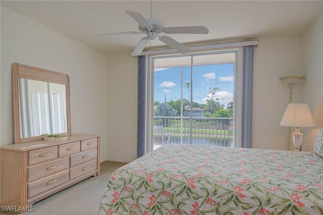 14931 Park Lake Dr Unit 209, Fort Myers, FL 33919 - bedroom with access to exterior, light colored carpet, and a ceiling fan