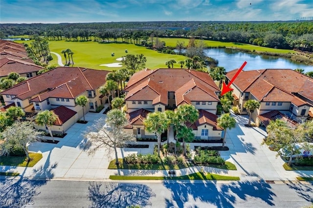 9232 Aviano Dr Unit 102, Fort Myers, FL 33913 - aerial perspective of suburban area with a golf club and a nearby body of water