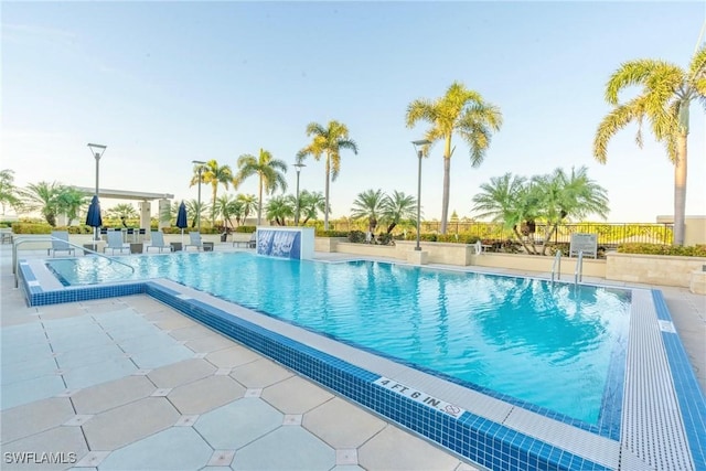 9115 Strada Pl Unit 5317, Naples, FL 34108 - community pool with a patio