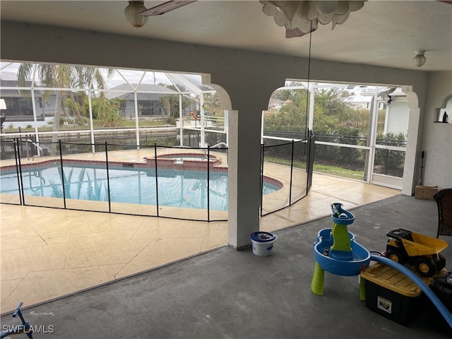 215 SE 1st Pl, Cape Coral, FL 33990 - view of pool with a pool with connected hot tub, a lanai, a patio area, and ceiling fan