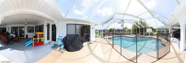 215 SE 1st Pl, Cape Coral, FL 33990 - view of pool with a patio, ceiling fan, a pool with connected hot tub, and glass enclosure
