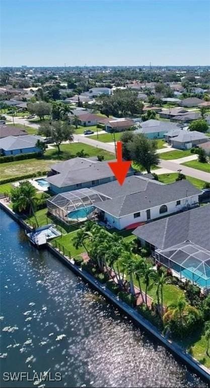215 SE 1st Pl, Cape Coral, FL 33990 - aerial perspective of suburban area featuring a nearby body of water