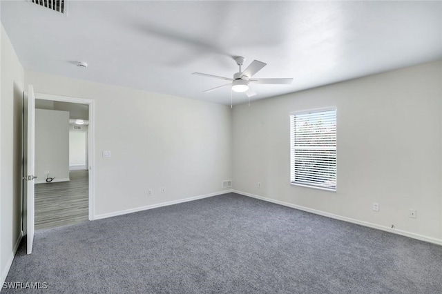 1717 43rd St SW, Naples, FL 34116 - spare room with ceiling fan, carpet, and baseboards