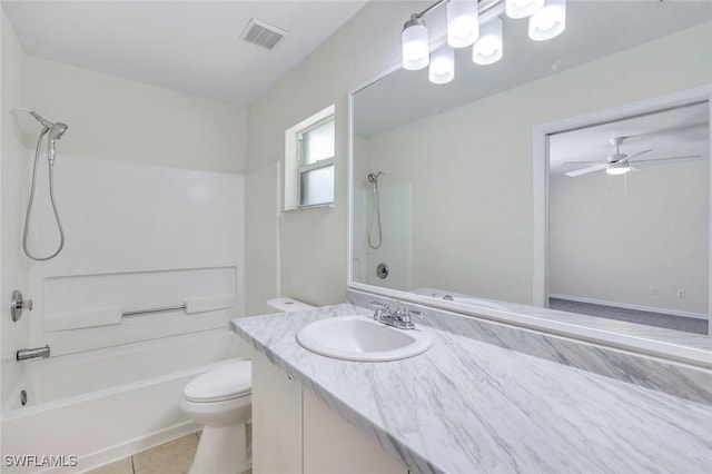 1717 43rd St SW, Naples, FL 34116 - full bathroom with shower / bathtub combination, toilet, vanity, tile patterned floors, and a ceiling fan