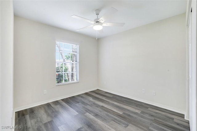 1717 43rd St SW, Naples, FL 34116 - unfurnished room featuring wood finished floors, baseboards, and ceiling fan