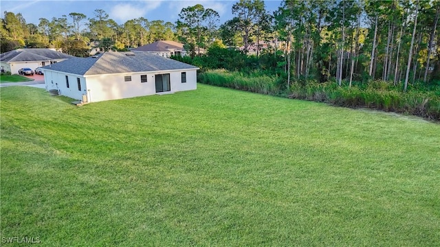 902 Magnolia Ave, Lehigh Acres, FL 33972 - view of grassy yard