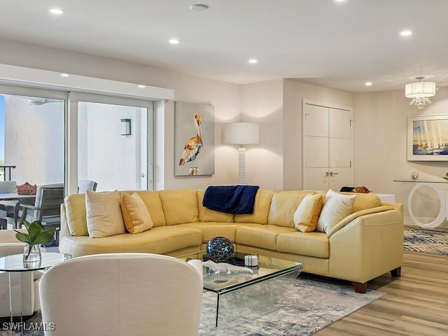 3951 Gulf Shore Blvd N Unit 1005, Naples, FL 34103 - living area featuring light wood-type flooring and recessed lighting
