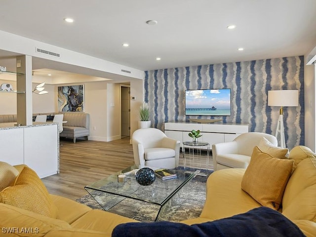 3951 Gulf Shore Blvd N Unit 1005, Naples, FL 34103 - living area with baseboards, wood finished floors, and recessed lighting
