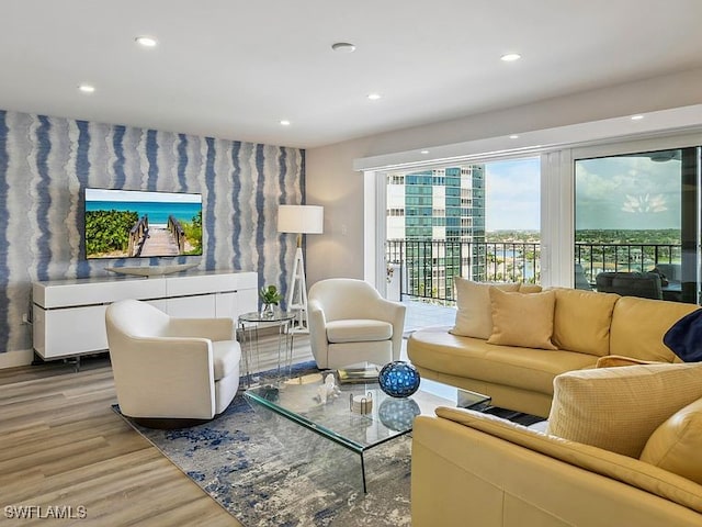 3951 Gulf Shore Blvd N Unit 1005, Naples, FL 34103 - living room featuring light wood-style floors and recessed lighting