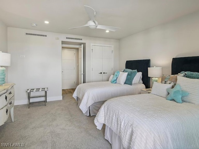 3951 Gulf Shore Blvd N Unit 1005, Naples, FL 34103 - bedroom featuring light carpet, baseboards, a ceiling fan, recessed lighting, and a closet