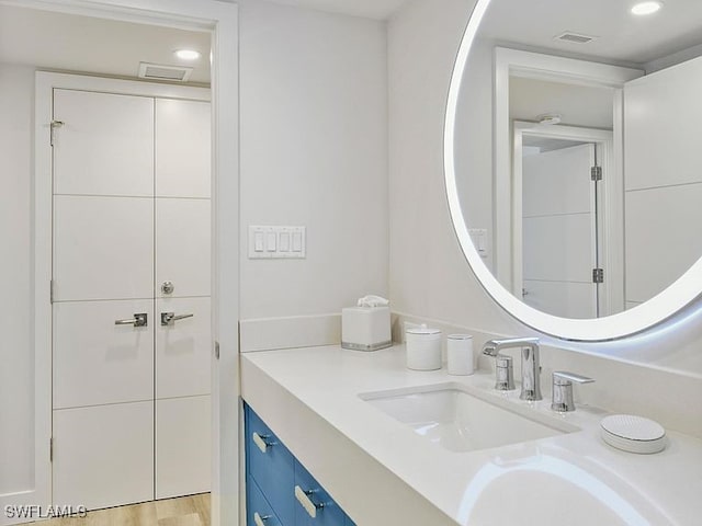 3951 Gulf Shore Blvd N Unit 1005, Naples, FL 34103 - bathroom featuring vanity and recessed lighting