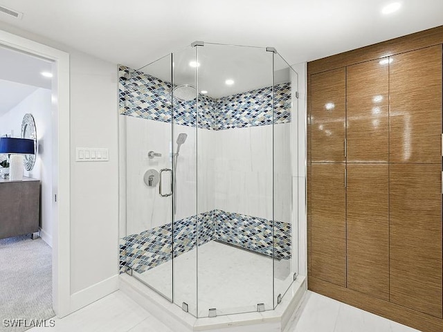 3951 Gulf Shore Blvd N Unit 1005, Naples, FL 34103 - bathroom with a shower stall, recessed lighting, baseboards, and a closet