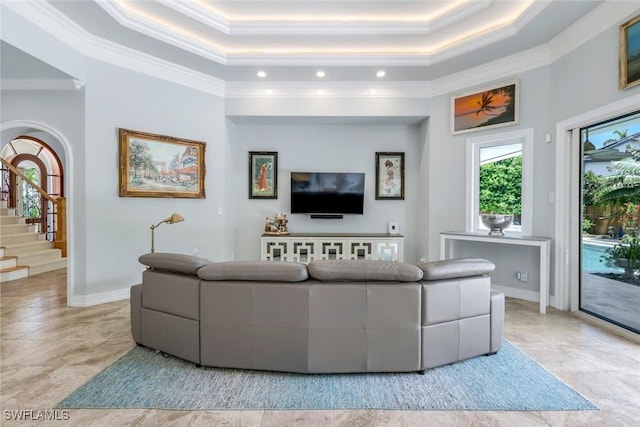 491 Wedge Dr, Naples, FL 34103 - living area with ornamental molding, a raised ceiling, stairs, and recessed lighting