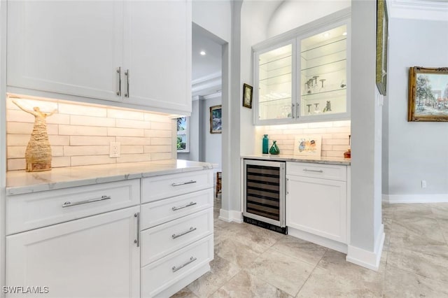 491 Wedge Dr, Naples, FL 34103 - indoor dry bar featuring wine cooler, decorative backsplash, and recessed lighting